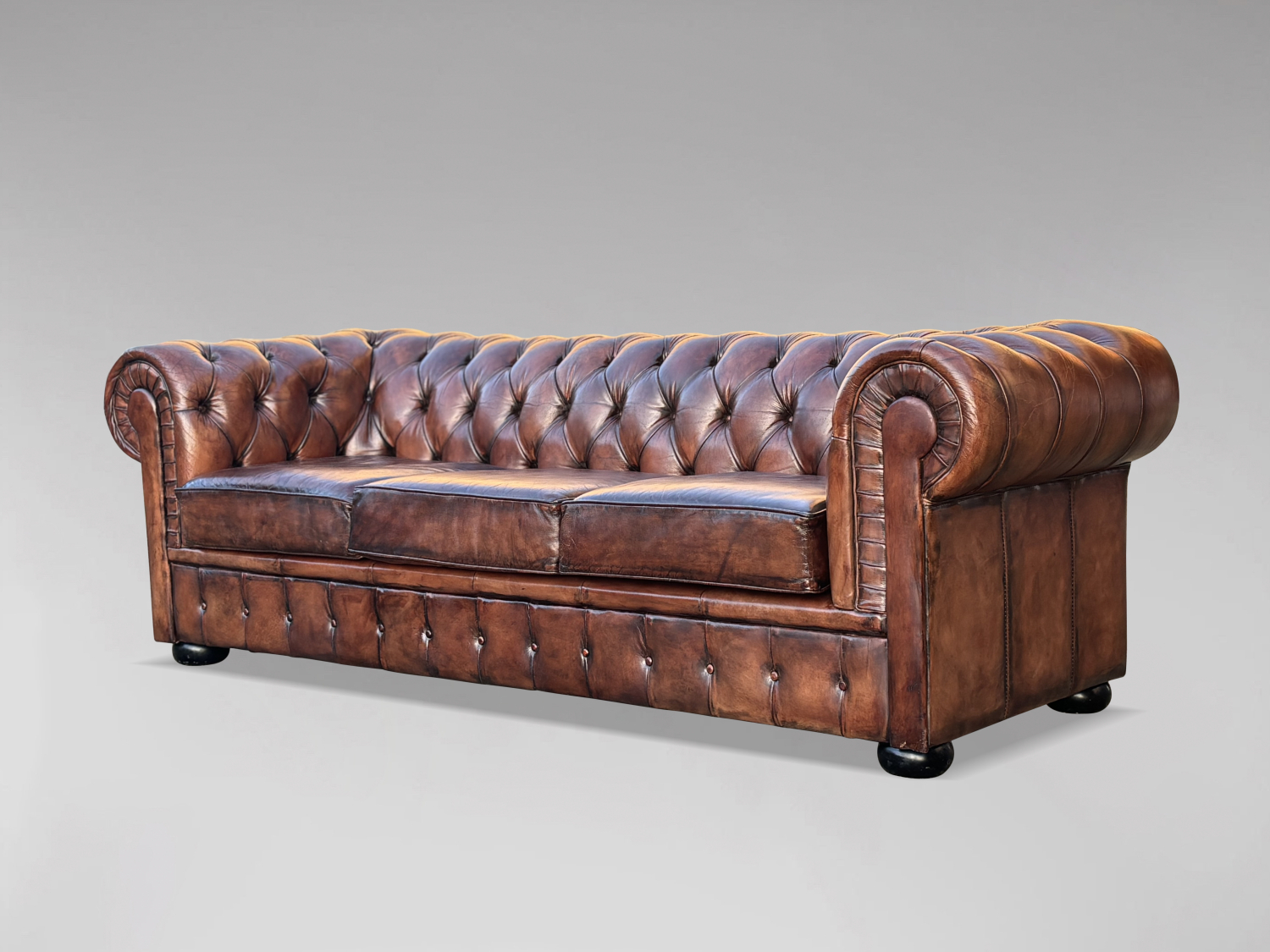 Enhance Your Space with an Antique Leather Chesterfield Sofa