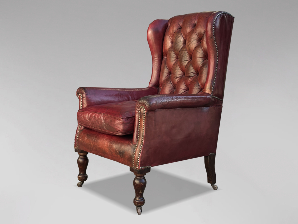 19TH CENTURY UNTOUCHED RED LEATHER BUTTON WING ARMCHAIR, C1880