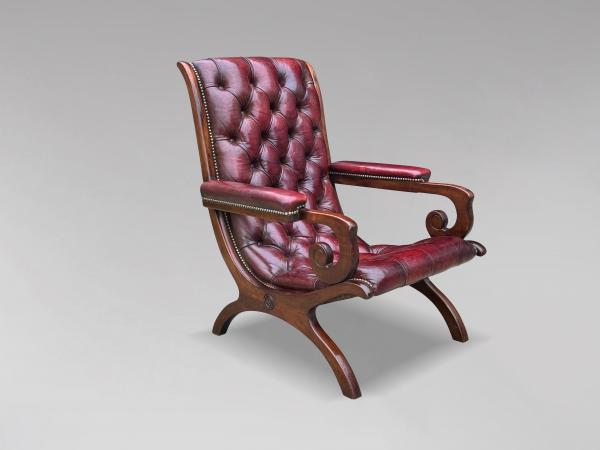 20TH CENTURY BURGUNDY RED LEATHER SLIPPER ARMCHAIR, C1920