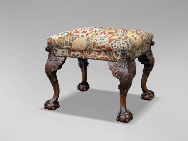 EARLY 19TH CENTURY REGENCY PERIOD CARVED WALNUT STOOL, C1820