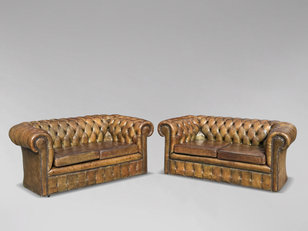 SOLD/PAIR OF GREEN LEATHER 2-SEATER CHESTERFIELDS